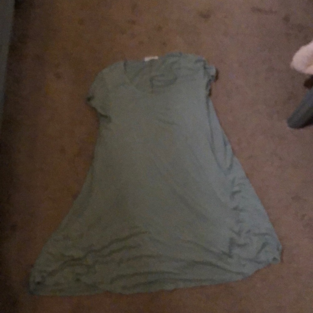 A aqua dress that is soft and fancy